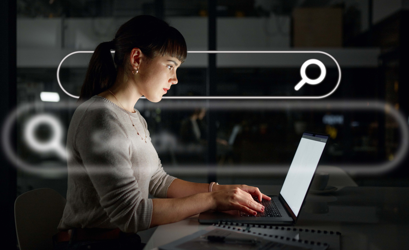 A woman working on her computer.
