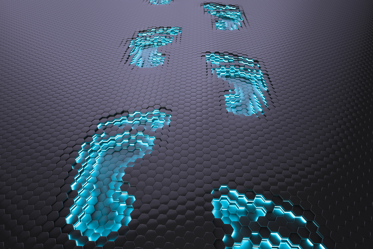 A black floor with blue pixilated footprints, showcasing Digital Footprints.